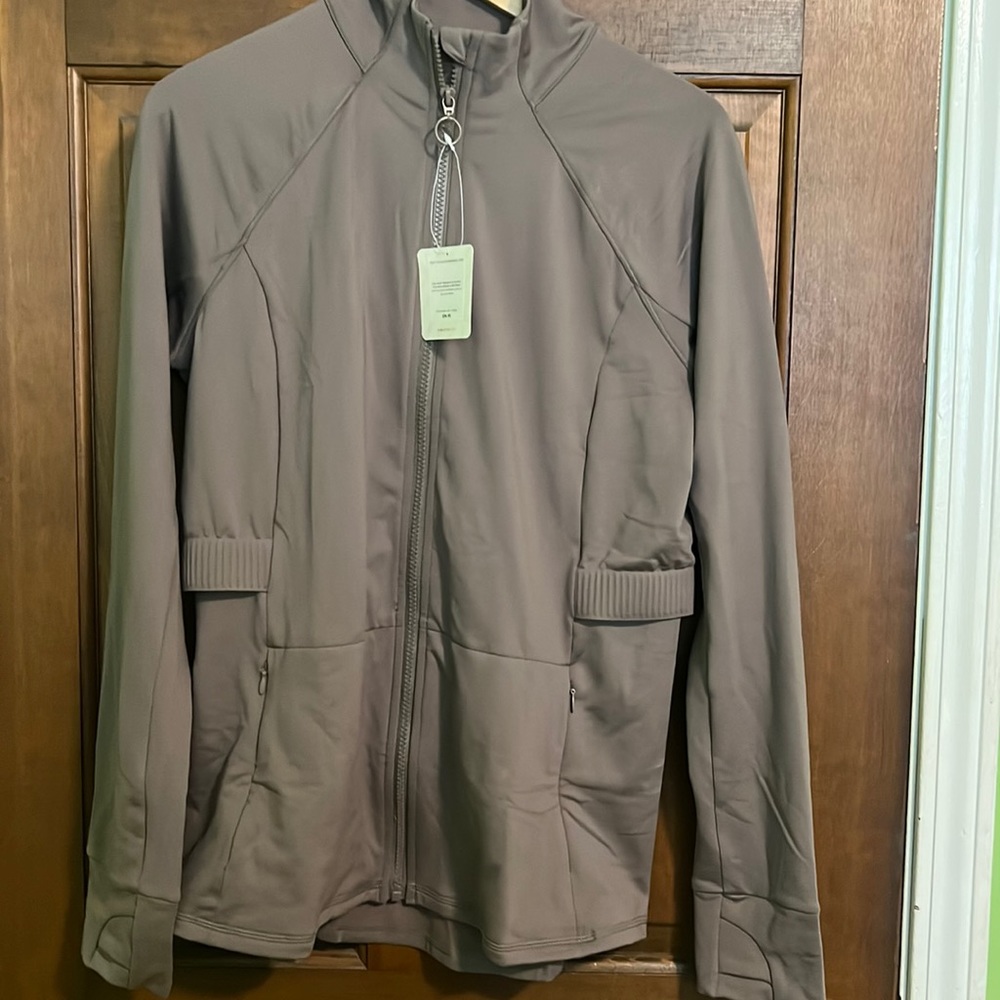 Fabletics new performance jacket. Brand new with tags. Super soft.
